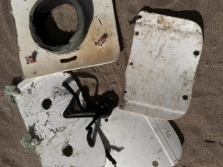 Various plastic lids used on whelk pots